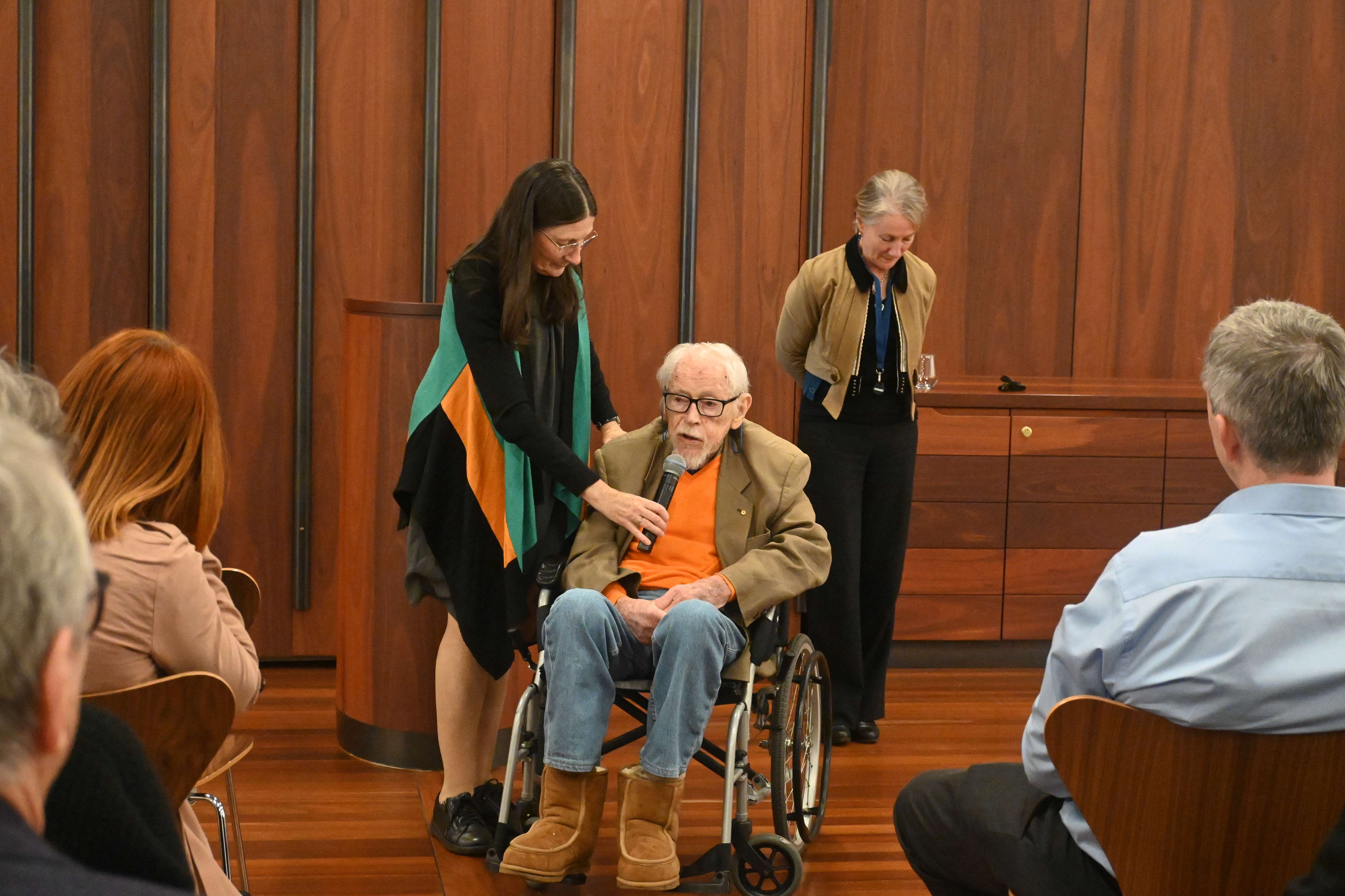 Guy Warren speaking at the exhibition launch.