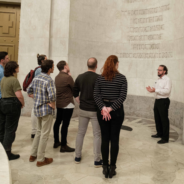 One of our guides leading a tour in the Hall of Memory.