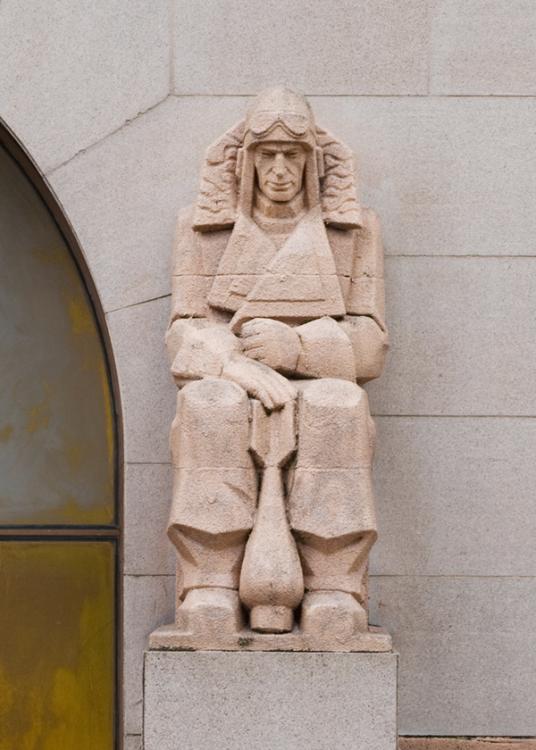 Photograph of the Aviator buttress sculpture on the Memorial's facade