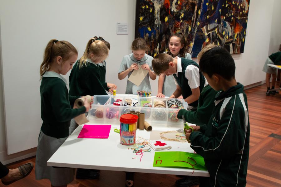 Stage 2 students making artworks during the workshop